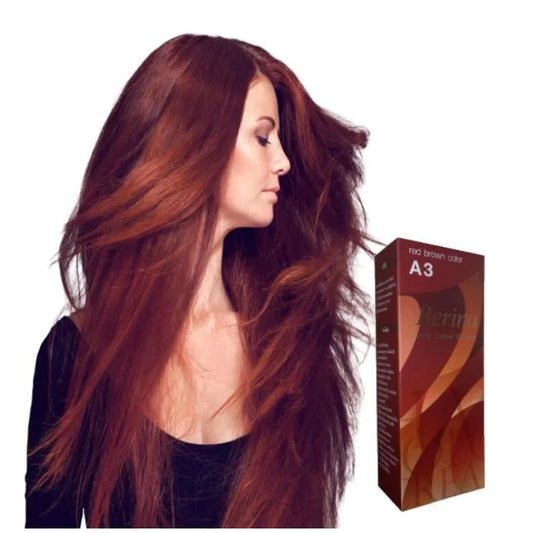 La photo montre une personne avec des cheveux longs brun-rouge, et une boîte de teinture pour cheveux de la marque 'Perina', étiquetée 'A3 red brown color'