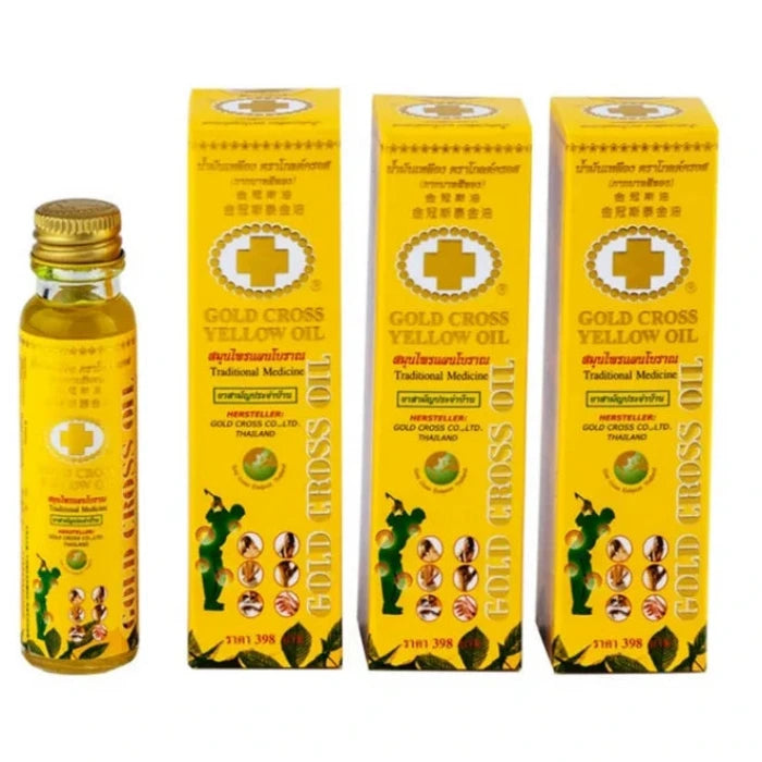 Photo du Gold Cross Yellow Oil, un remède traditionnel thaïlandais présenté en flacon et boîtes jaunes. Le produit est utilisé pour soulager douleurs musculaires, piqûres d’insectes et inconforts quotidiens. Packaging jaune vif avec croix dorée distinctive.