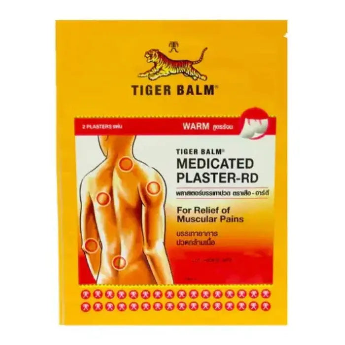 Emballage de Tiger Balm Medicated Plaster-RD, montrant un logo de tigre, une image de dos humain avec des cercles rouges indiquant les zones de douleur, et des informations sur le soulagement des douleurs musculaires. Contient 2 patchs chauds.
