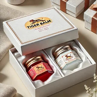 Coffret cadeau élégant contenant deux baumes Tiger Balm, rouge et blanc, usages, conseils