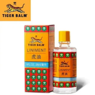 Baume du Tigre : boîte et flacon de liniment liquide