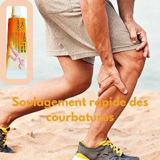 Flacon orange et jambe douloureuse d'un coureur sur la plage