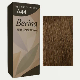 Boîte de teinture Berina A44 avec mèche de cheveux châtain clair mat en gros plan.