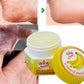 Baume hydratant Supreme à la banane présenté avec des photos avant/après montrant la réparation de talons secs et craquelés. L’image met en avant un soin nourrissant destiné à adoucir la peau abîmée des pieds et des mains, avec une texture riche et réparatrice.