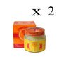  2 Pots et boîte de baume White Monkey Holding Peach avec étiquette représentant un singe tenant une pêche. Texte en thaï et en anglais. Utilisé pour soulager les douleurs musculaires.