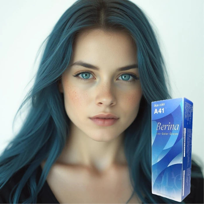 Jeune femme aux longs cheveux bleus et aux yeux bleus, posant à côté d'une boîte de teinture Berina A41.