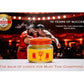 Image promotionnelle pour un baume antidouleur, montrant un pot avec une étiquette jaune et rouge et un symbole de trophée. Contexte avec deux personnes en combat de Muay Thai. Texte : '70 YEARS OF SUCCESS', 'Thailand's No. 1 pain reliever balm, NOW IN INDIA', 'The balm of choice for Muay Thai Champions', et un sceau 'GENUINE PRODUCT