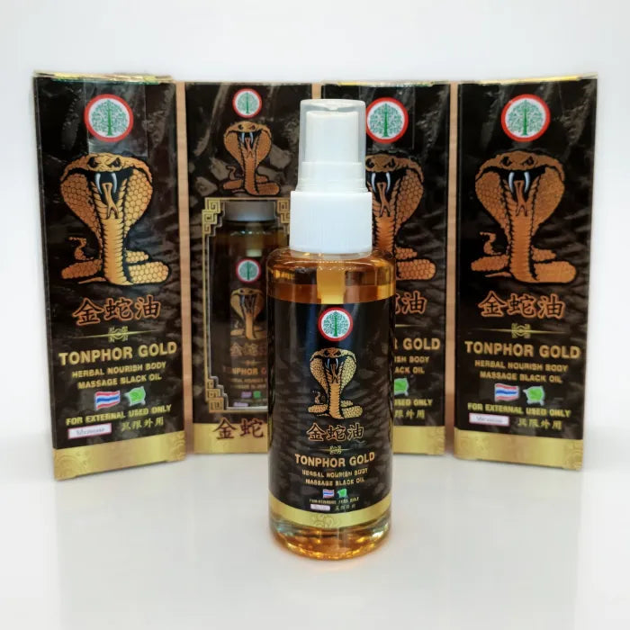 Flacon de Tonphor Gold Herbal Nourish Body Massage Black Oil devant trois boîtes assorties. Huile de massage utilisée pour apaiser rapidement tensions musculaires et inconforts. Packaging noir et or avec cobra, évoquant un soin puissant et traditionnel.