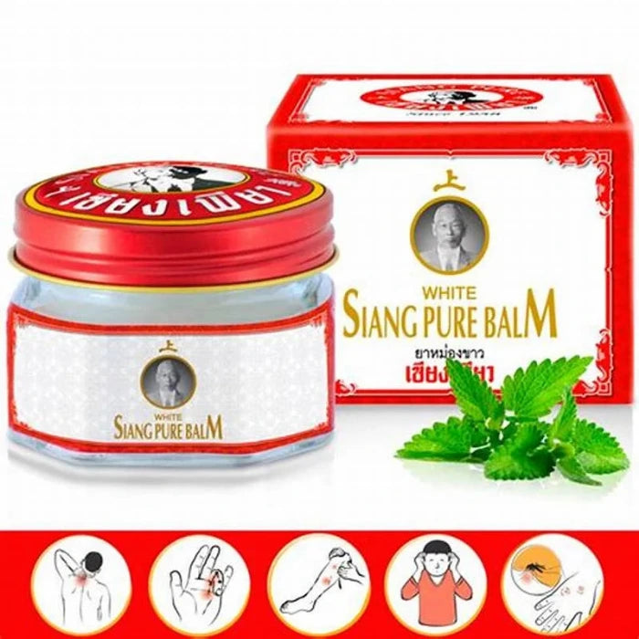Pot et emballage de baume White Monkey Holding Peach. L'étiquette montre un singe tenant une pêche, avec du texte en thaï et en anglais. Les ingrédients principaux incluent le salicylate de méthyle, le camphre et le menthol. Utilisé pour soulager les douleurs musculaires et articulaires.