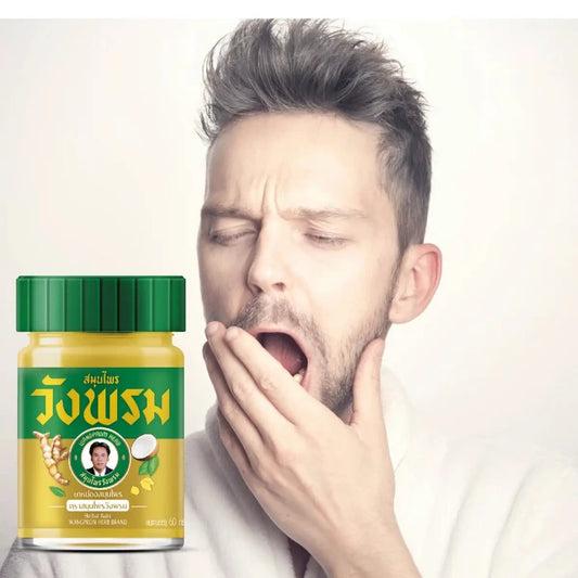 pot de baume Gold de la marque Wangprom Herb avec un homme qui baille